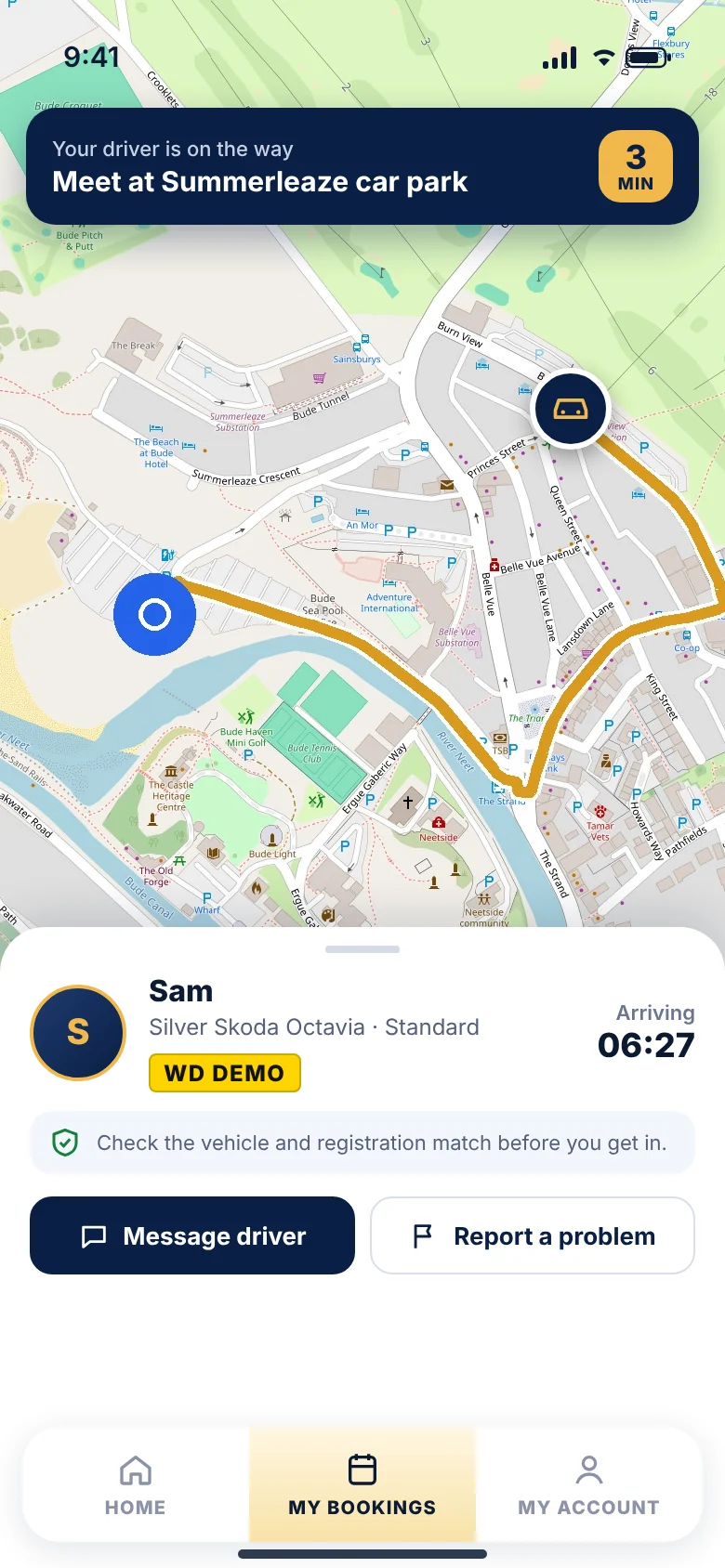 WhyDrive tracking screen: a street map of Bude showing the pickup point and the assigned taxi approaching, arriving in about 3 minutes, with driver and vehicle details.